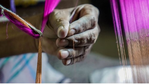 Hand weaver in India Credit Omar Khan/CNN